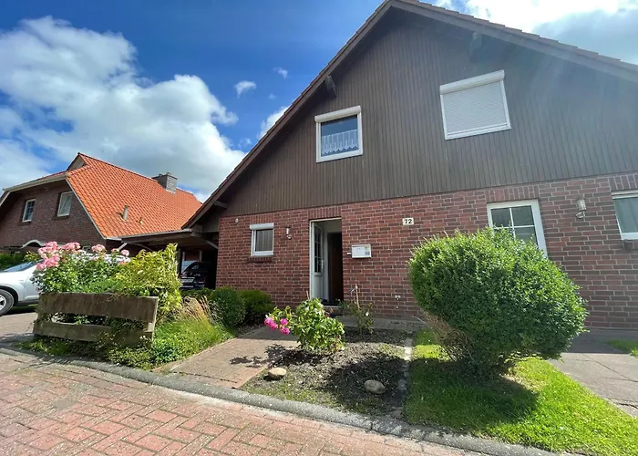 Haus Tillmann Mit Hund In Hooksiel Schillig